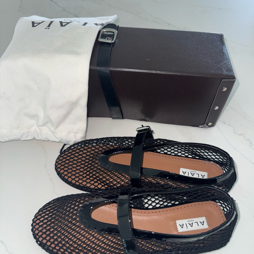 Alaia Black Mesh Flats with Elegant Design
